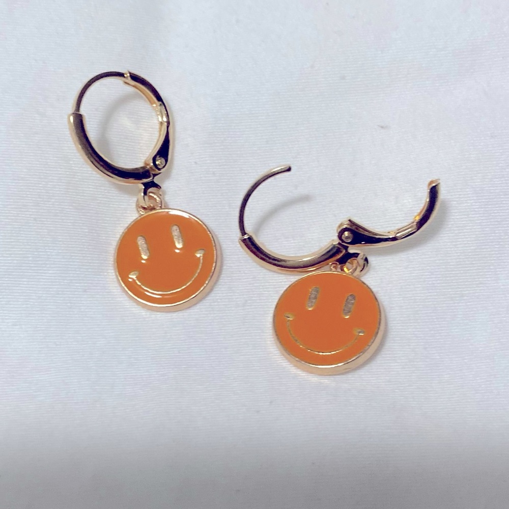 Orange smiley face earrings